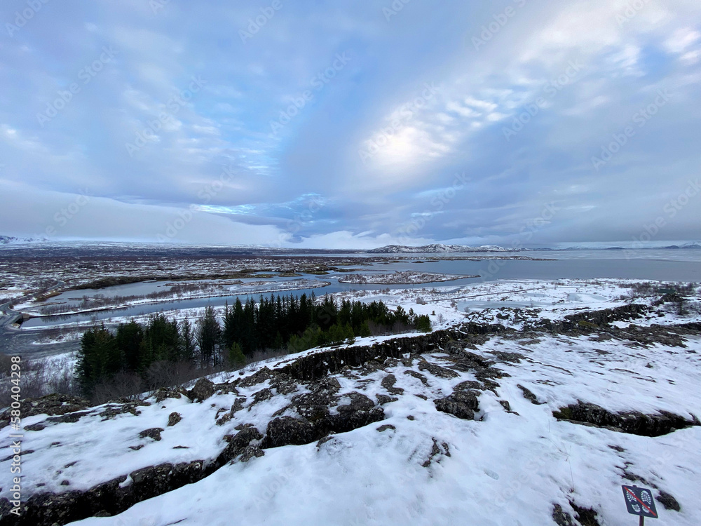 Icelandic landscape with fjord, lake and mountains in winter at Pingvellir National Park Icelandic landscape with fjord, lake and mountains in winter at Pingvellir National Park