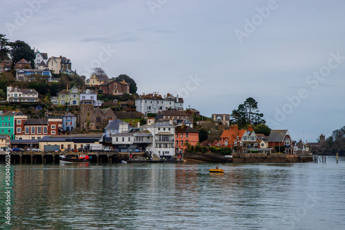Kingswear - coastal town in Devon with vibrant and colourful buildings. View from Dartmouth side of the river 
