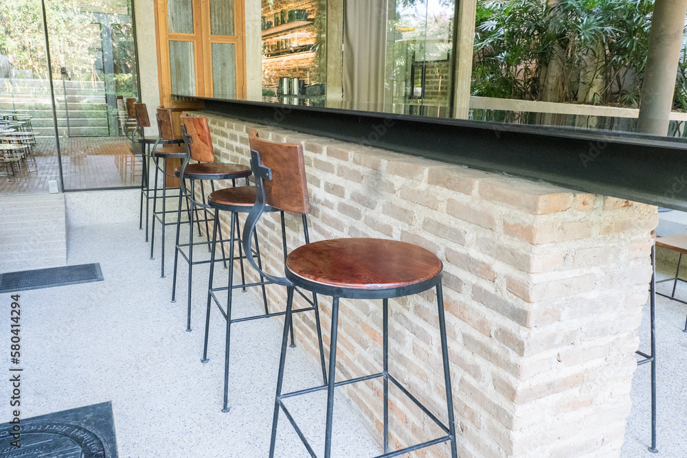 Fototapeta premium Circular metal table and chair at restaurant.