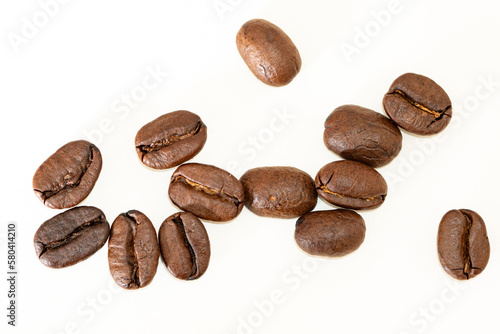 Coffee beans isolated on white background, macro