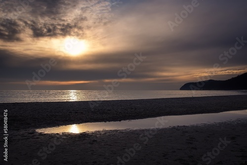 Morning sea landscape. Sunrise on the beach by the Polish Baltic sea. © shadowmoon30