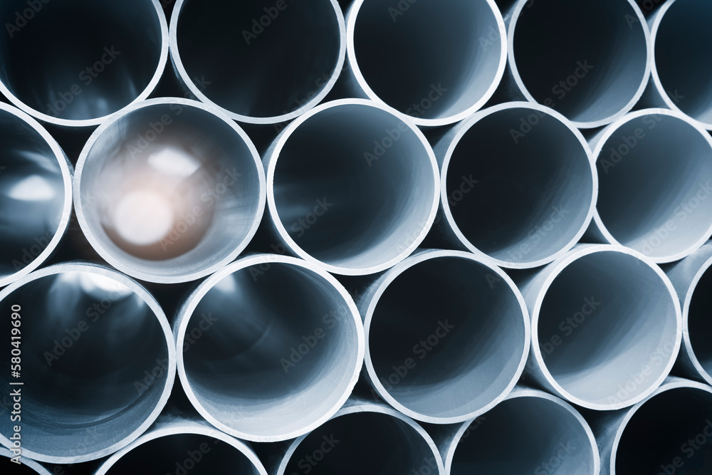 PVC pipes bacground, background of big plastic pipes used at the building site. PVC pipes bacground, background of big plastic pipes used at the building site.