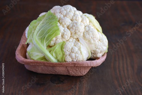 cauliflower on wooden background
