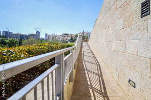 View of pathway with fence ...