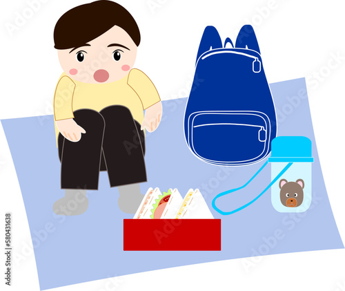 ピクニックする男の子
