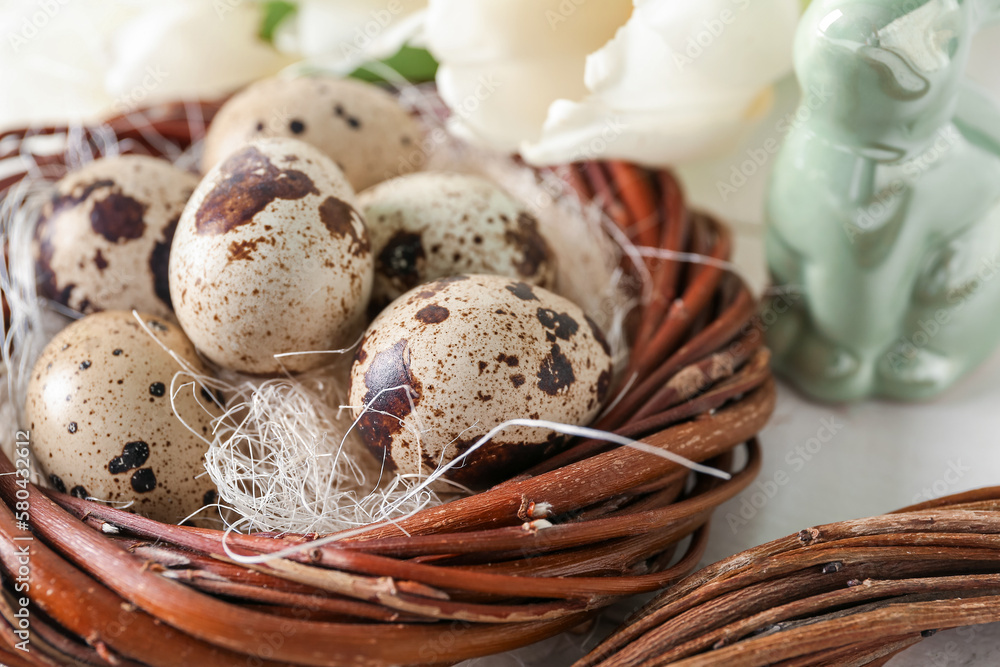 Nest with Easter quail eggs, closeup Nest with Easter quail eggs, closeup
