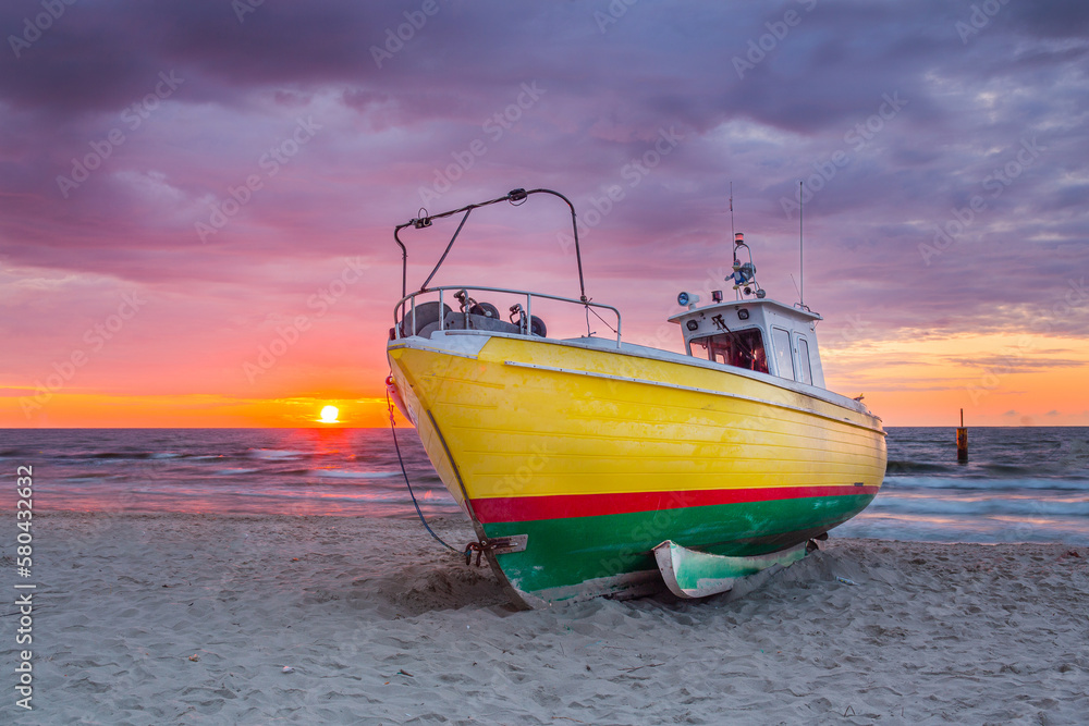Fishing boat against the backdrop of a beautiful sunset Fishing boat against the backdrop of a beautiful sunset