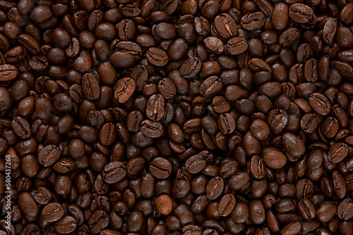 Roasted coffee beans. Texture of coffee beans. Coffee background.