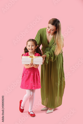 Cute little girl greeting h...