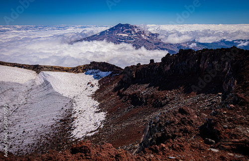 Vista de la cumbre del volcán Tolhuaca entre las Nubes desde la cumbre del volcán Lonquimay, region de la Araucanía, Chile photo