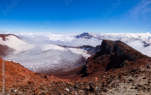 Cumbre del volcán Tolhuaca entre las Nubes desde la cumbre del volcán Lonquimay, region de la Araucanía, Chile photo