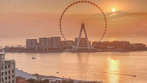Photography Sunset over Bluewaters island with modern architecture and ferris wheel aerial timelapse