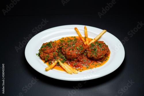 Afghan Meatballs Stir Cooked isolated on black background