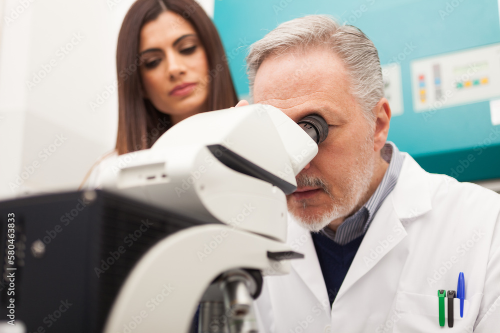 Senior scientist at work in a laboratory Senior scientist at work in a laboratory