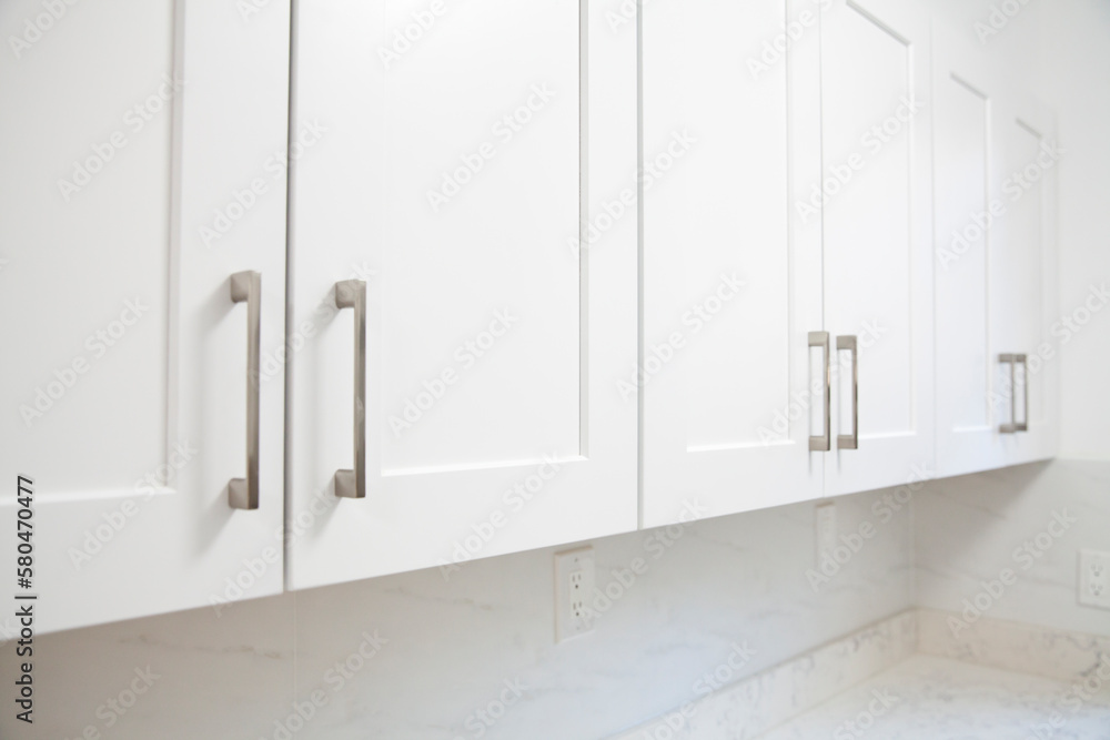 white kitchen cabinet in the kitchen - obrazy, fototapety, plakaty 