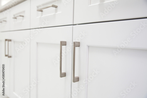 Close up view of white kitchen cabinet