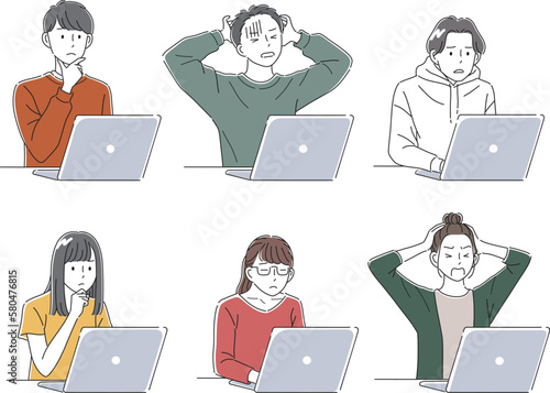 困った表情でノートパソコンを見ているビジネスパーソン