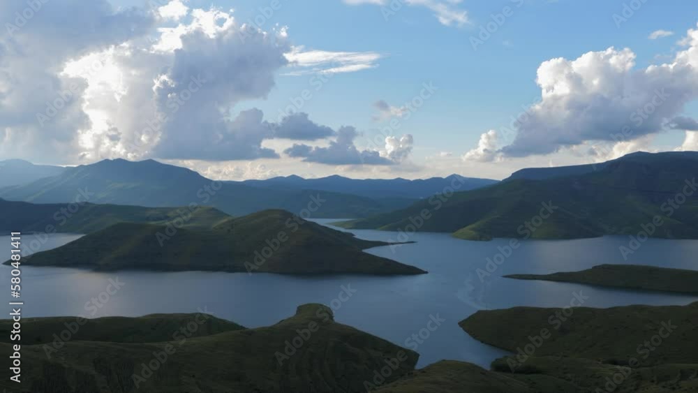 Static high angle view of man-made hydro dam water reservoir, Lesotho Static high angle view of man-made hydro dam water reservoir, Lesotho