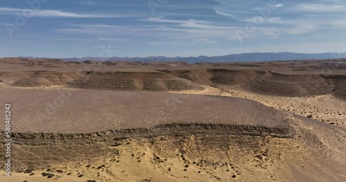 Aerial footage of Kasuy Dunes In the Southern Negev and Arava region. Amazing golden sand dunes. Filmed in C4K Apple ProRes 422 HQ photo