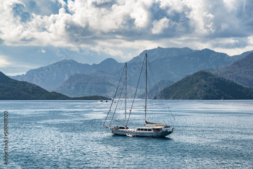 Awesome view of yacht crossing Marmaris Harbor, Turkey