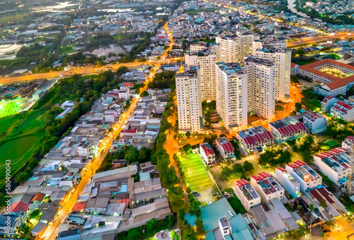 Ho Chi Minh City, Vietnam aerial view with residential area below showing the urban development of Vietnam in the 21st century