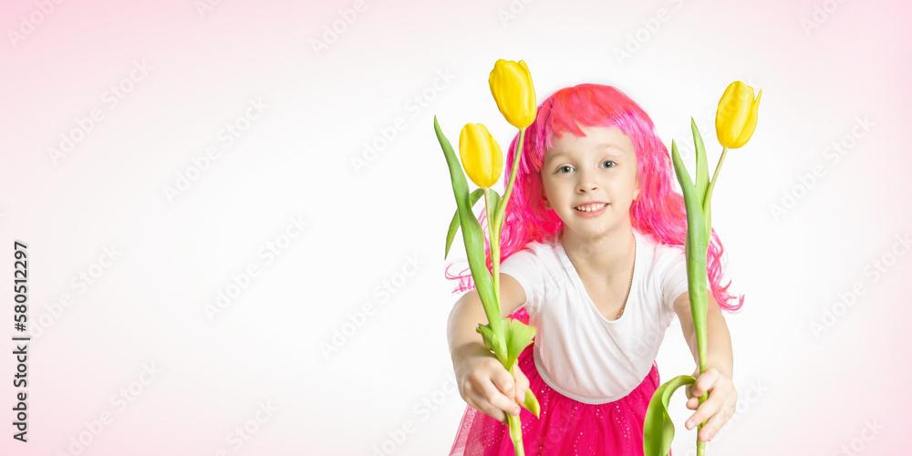 portrait of a little girl with a bouquet of spring flowers. smiling little girl giving flowers. banner with copy space.