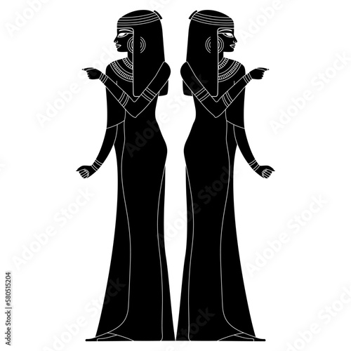 Symmetrical design with two standing ancient Egyptian young women in long dresses. Pretty ladies. Black and white negative silhouette.