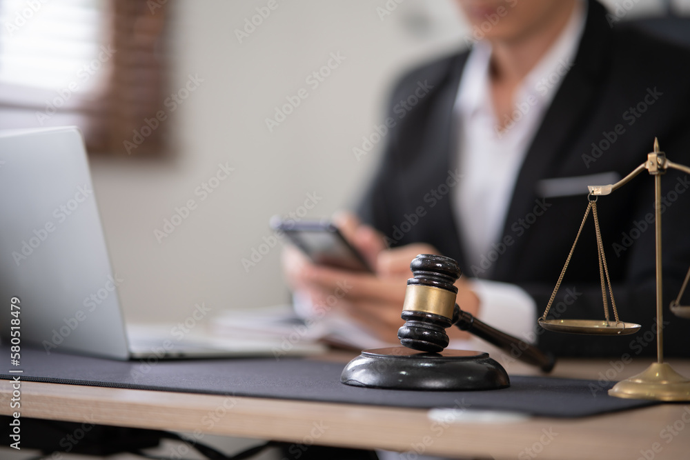 Lawyers sit for a meeting with the team at the law firm. Lawyers sit for a meeting with the team at the law firm.
