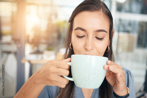 Coffee drink, cup and face of woman drinking hot chocolate, tea or morning beverage for hydration, wellness or to relax. Caffeine, female business manager or corporate office person with espresso mug