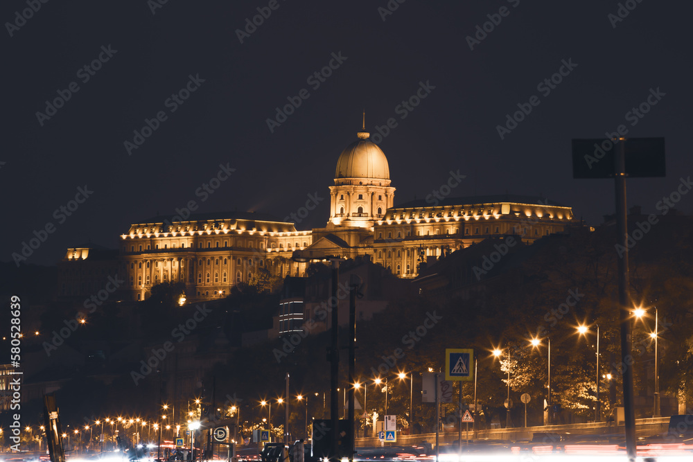 Buda Castle at night from Danube river, Hungary