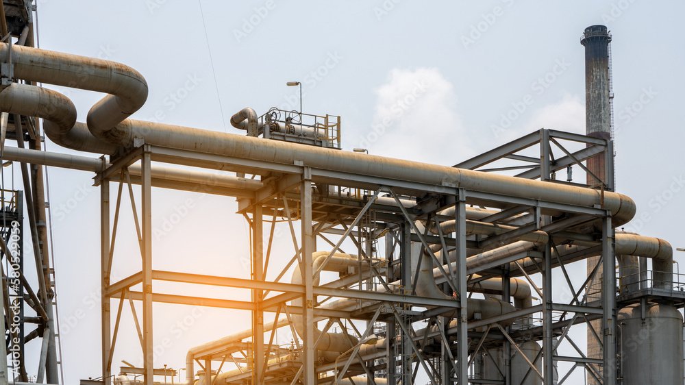 Naklejka premium Oil Refinery Gas Chemical Equipment Prodiction import export Concept, Crude Oil Refinery Plant Steel Pump Pipe line and Chimney and Cooling tower, Chemical or Petrochemical Factory plant, industry