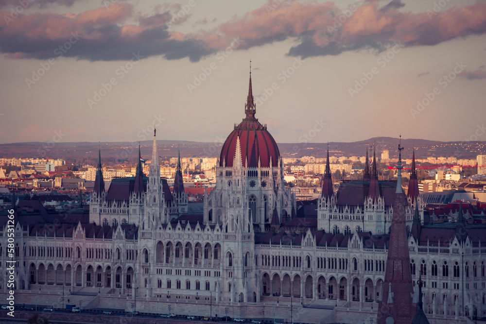 Budapest parliament in magic sunset, and the Danube river, Hungary
