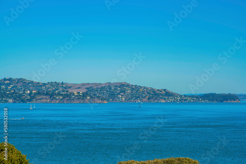 Mountains in distance near alcatraz in downtown san francisco california near ocean and city in landmark hills