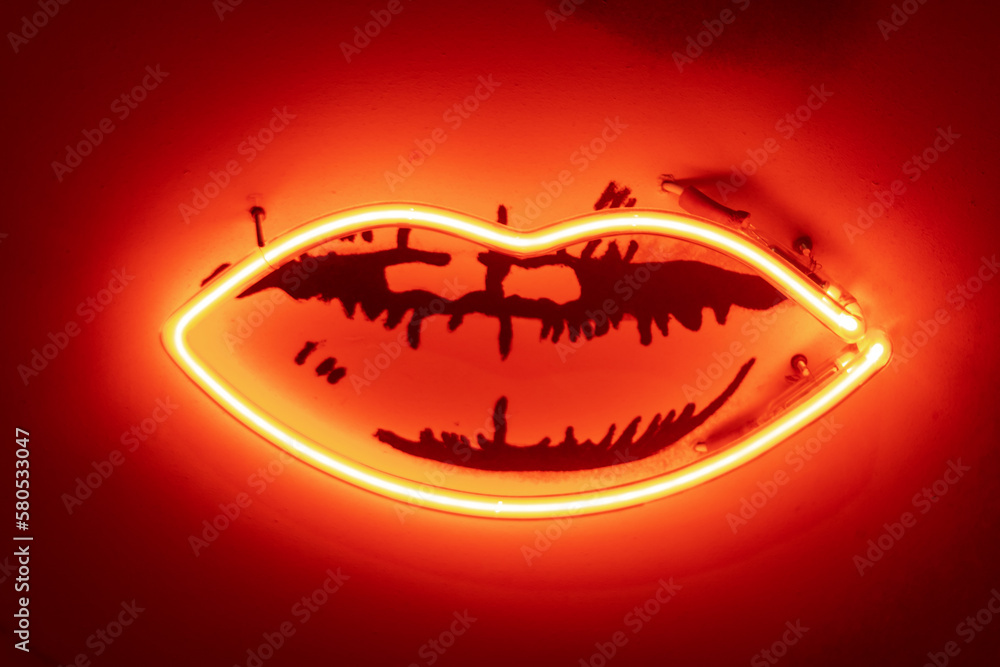 Neon light in the shape of a woman's lips