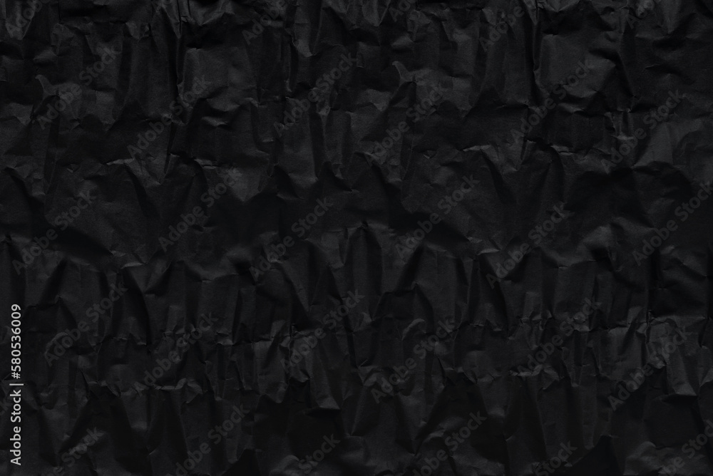 Fototapeta premium black crumpeled wrapping rough paper pattern for background
