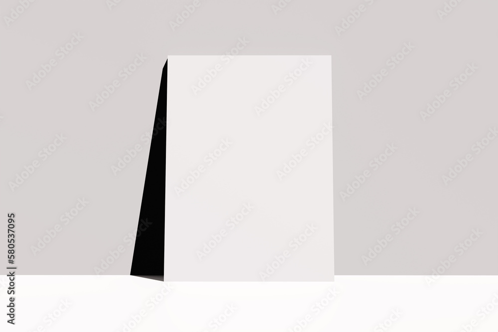 Empty blank white poster leaning on a wall. Empty blank white poster leaning on a wall.