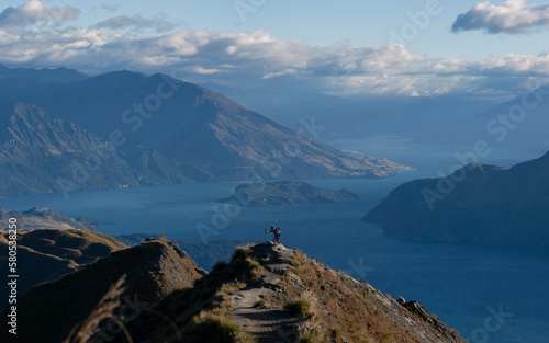 Roys peak mountain hike in Wanaka New Zealand. Popular tourism travel destination. Concept for hiking travel and adventure. New Zealand landscape background