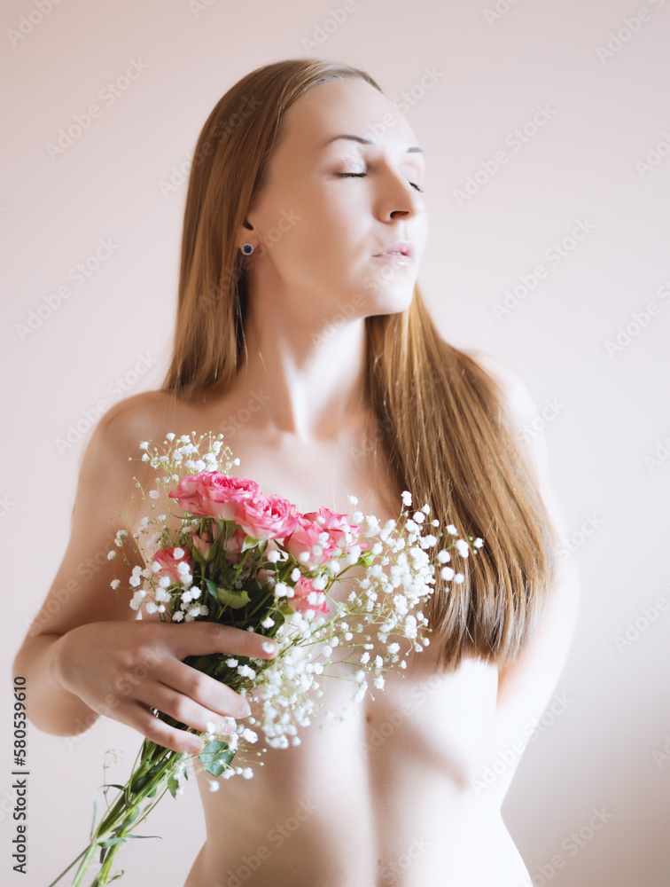 Young woman with bouquet of flowers. Young woman with bouquet of flowers.