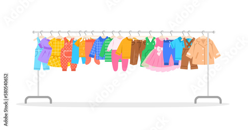 Baby clothes on a long shop hanger rack. Little boy and girl different garments hanging on store hanger stand. Children dresses, shirts, pants and coat. Flat cartoon illustration. Sale or second hand