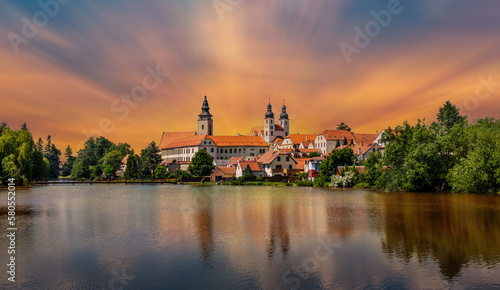 View of Telc across pond with reflections, South Moravia, Czech Republic. © Sergey Fedoskin