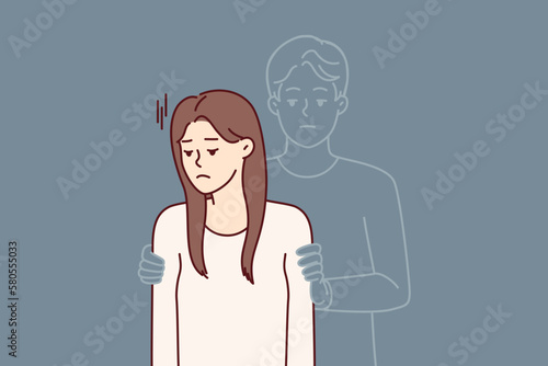 Sad girl with silhouette of man hugging beloved for concept of breaking up with boyfriend or lack of physical intimacy. Sad woman widow feels presence of dead husband stressed after funeral 