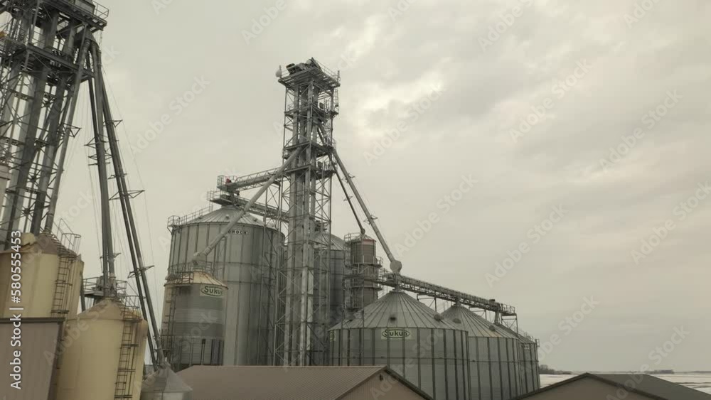 Drone shot of a semi loading feed at a farm's feed mill in Minnesota Drone shot of a semi loading feed at a farm's feed mill in Minnesota