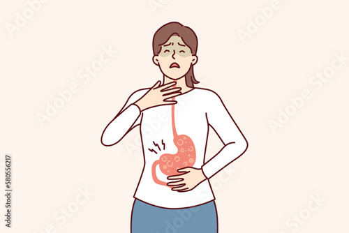Sick woman with symptoms of gastroesophageal reflux or gastritis disease resulting from junk food. Girl suffers from gastritis and violation of digestive processes surviving nausea