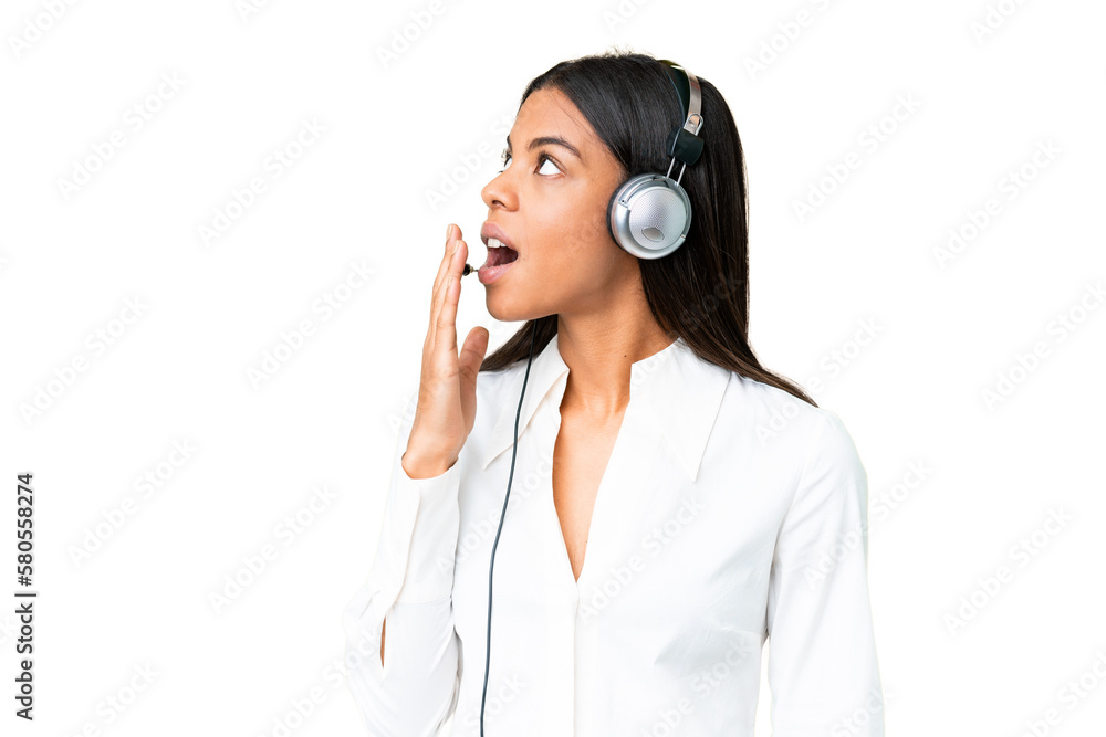 Telemarketer African American woman working with a headset over isolated chroma key background yawning and covering wide open mouth with hand Telemarketer African American woman working with a headset over isolated chroma key background yawning and covering wide open mouth with hand
