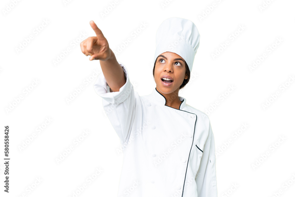 Young African American chef over isolated chroma key background pointing away Young African American chef over isolated chroma key background pointing away