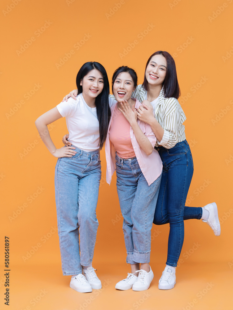 Fototapeta premium Image of young three Asian girl on background