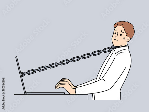 Stressed male employee tied with chain to computer in office. Unhappy man worker attached to laptop struggle with stressful job. Vector illustration. 