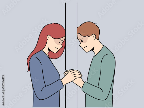 Unhappy couple separated by wall suffer from breakup or separation. Upset distressed man and woman struggle with relationships split. Vector illustration. 