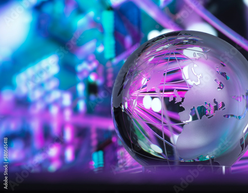 Crystal globe with fibre optics processing data in background photo