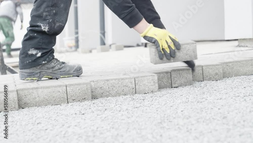 construction of a sidewalk made of concrete blocks, copy space